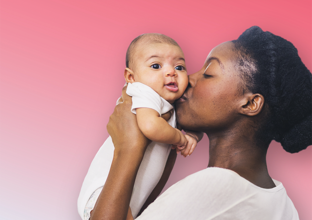 Smiling doctor with child patient