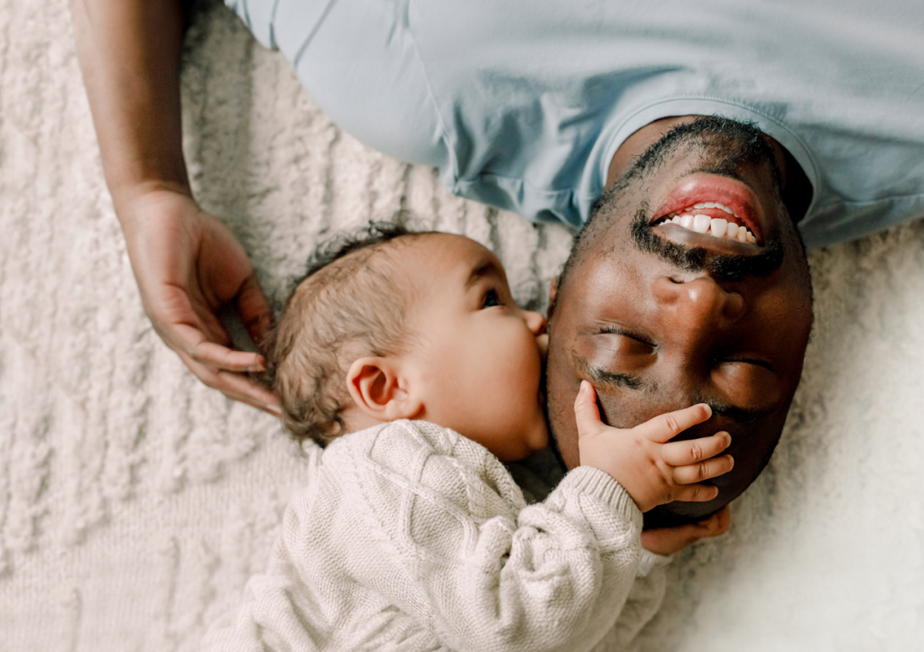 Napping dad and baby