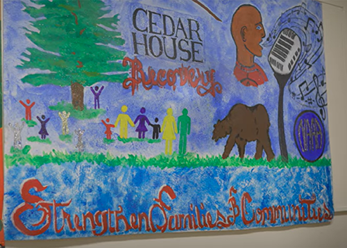 A sign of encouragement greets patients and staff inside Cedar House in Bloomington.