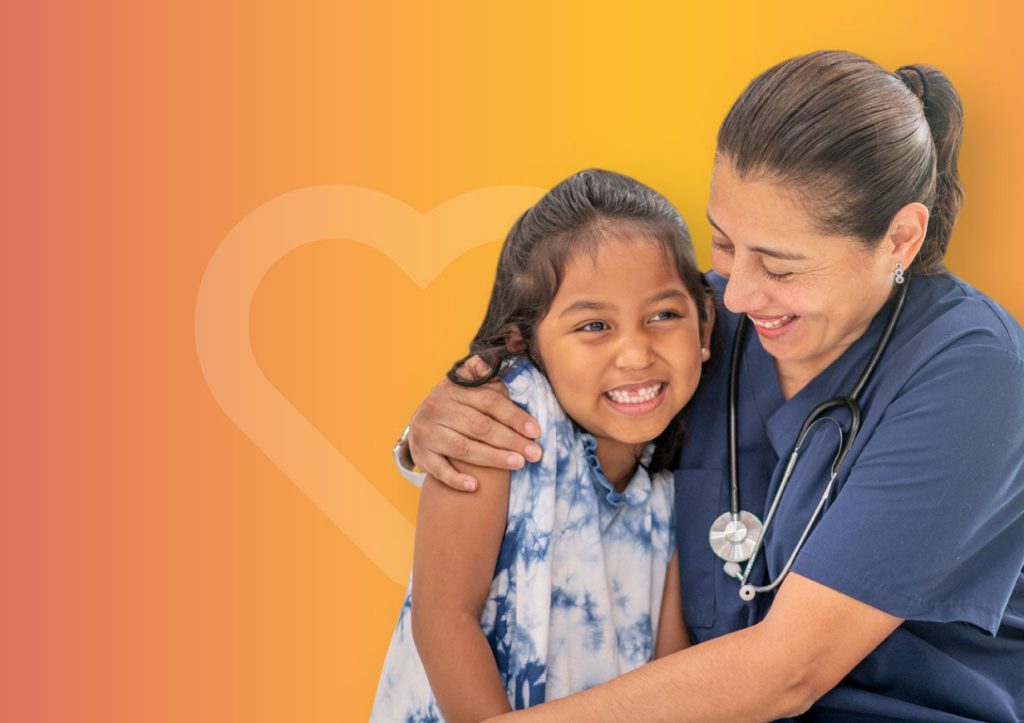 Smiling doctor with child patient