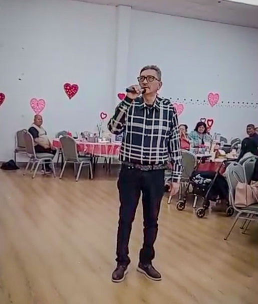 sergio talking on microphone
