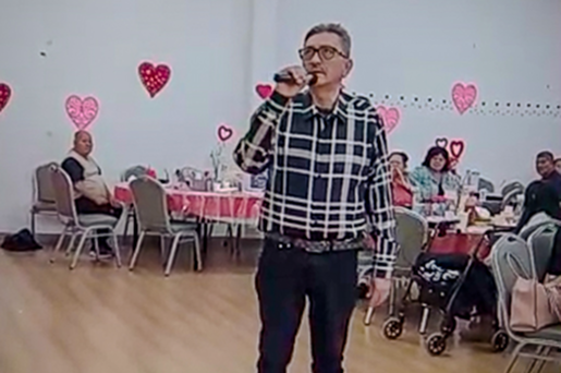 iehp member sergio holding microphone