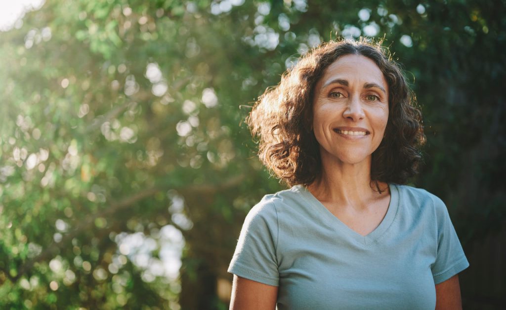 woman smiling outside