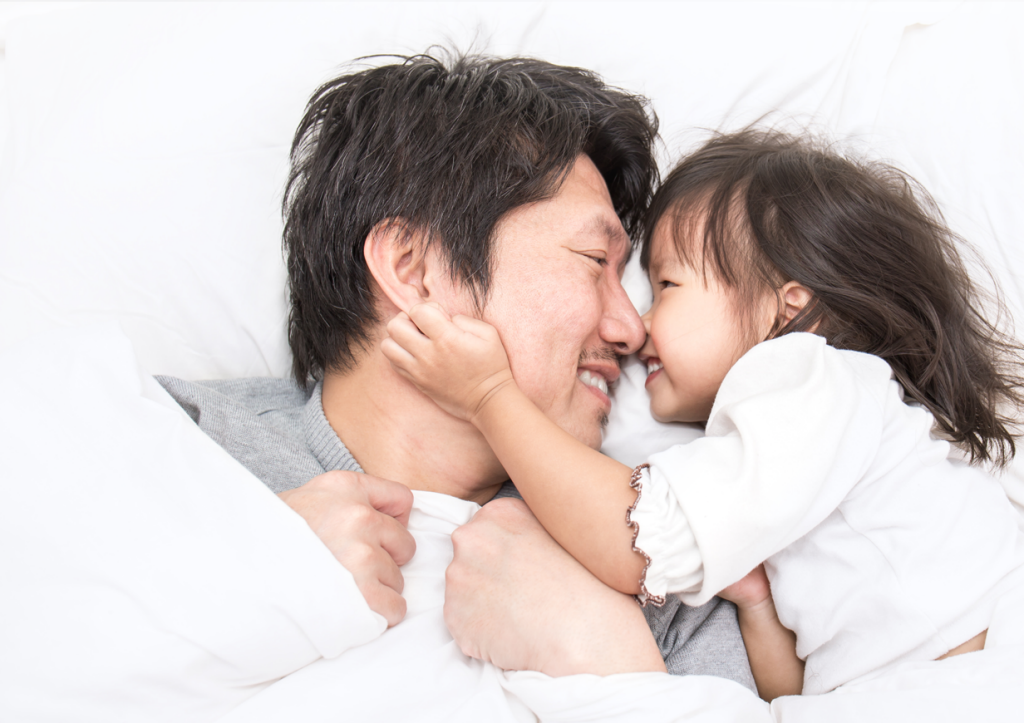 Smiling dad with baby