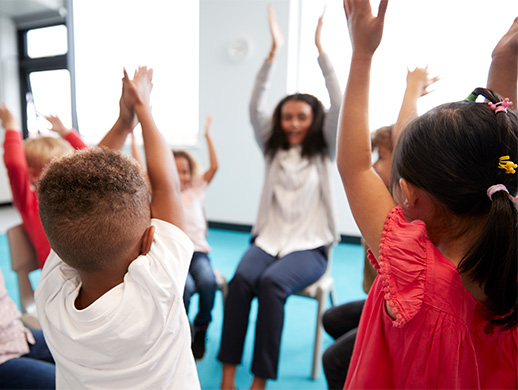 students in class stretching